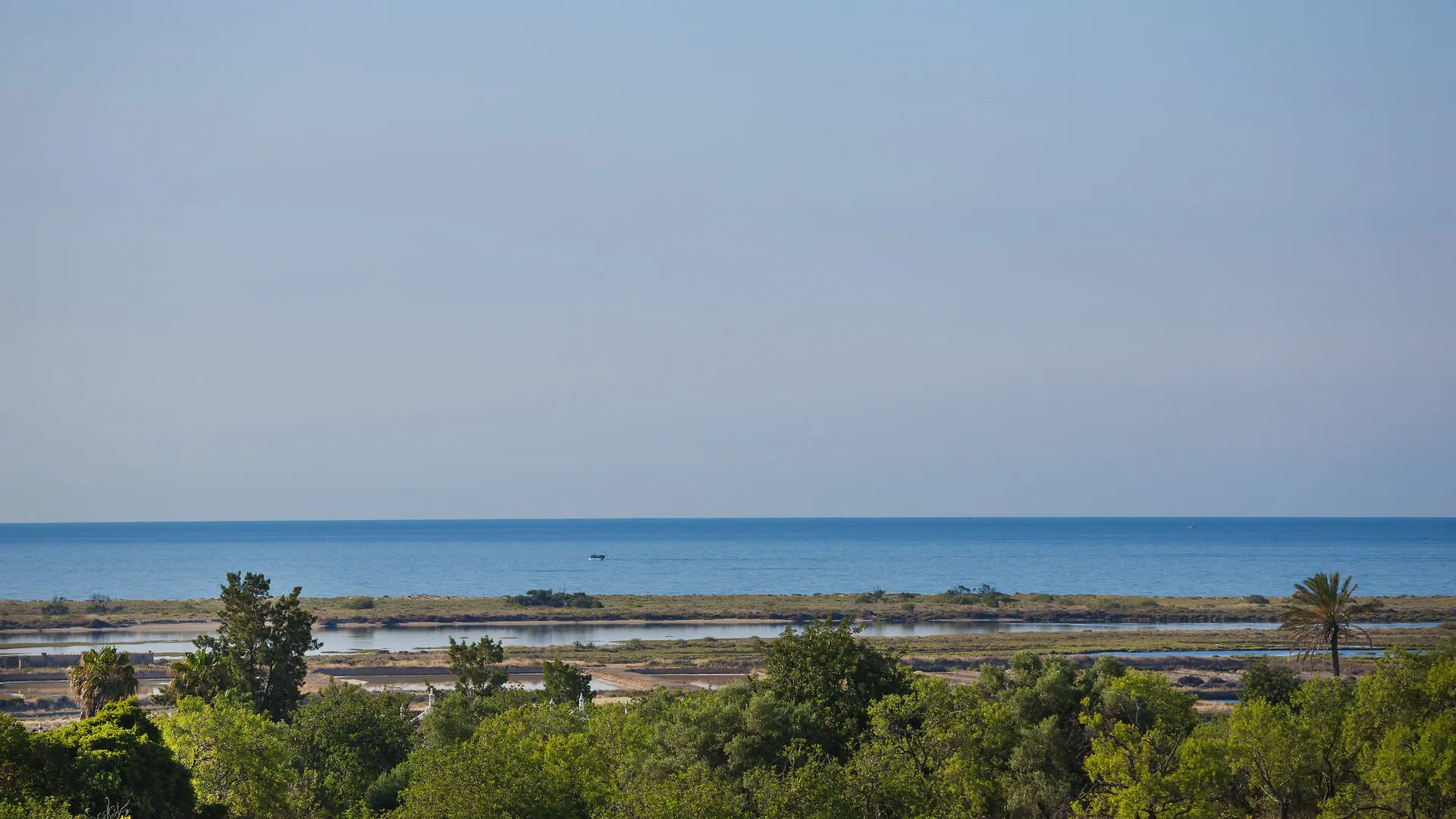 Ozadi Tavira Hotel